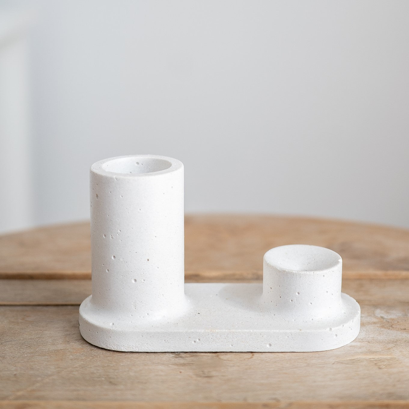 Circular incense holder hand-made with white cement. Made by Paige Soy Candles